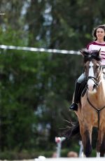 SABRINA BARTLETT Riding a Horse on the Set of The Larkins in London 05/12/2021