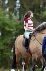 SABRINA BARTLETT Riding a Horse on the Set of The Larkins in London 05/12/2021