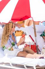 SHAY MITCHELL Relaxing on the Beach in Miami 05/01/2021
