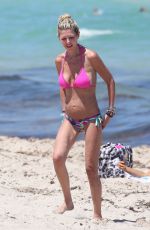 TARA REID in a Pink Bikini at a Beach in Miami 05/11/2021