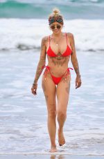 TINA LOUISE in a Red Bikini at Venice Beach 05/17/2021