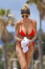 TINA LOUISE in a Red Bikini at Venice Beach 05/17/2021