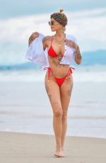 TINA LOUISE in a Red Bikini at Venice Beach 05/17/2021