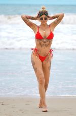 TINA LOUISE in a Red Bikini at Venice Beach 05/17/2021