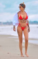 TINA LOUISE in a Red Bikini at Venice Beach 05/17/2021