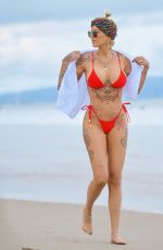 TINA LOUISE in a Red Bikini at Venice Beach 05/17/2021