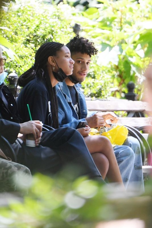 WILLOW SMITH and Tyler Cole Having Lunch on a Bench in Union Square Park 05/25/2021
