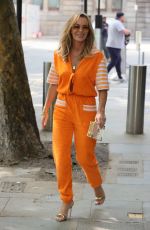 AMANDA HOLDEN in a Orange Jumpsuit Out in London 06/24/2021
