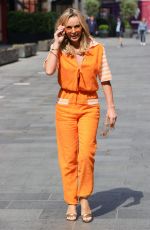 AMANDA HOLDEN in a Orange Jumpsuit Out in London 06/24/2021