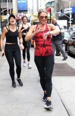 AMY ROBACH Running to Good Morning America on National Running Day in New York 06/02/2021
