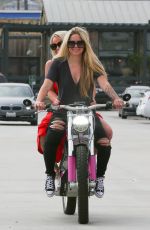 AVRIL LAVIGNE Taking Her Friend for an Electric Motorcycle Ride in Malibu 05/31/2021