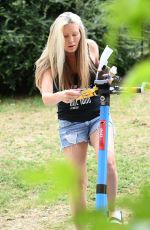 CAPRICE BOURRET in Denim Shorts Out at a Park in London 06/16/2021