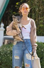 CARA SANTANA in Ripped Denim Out with Her Dog in Los Angeles 06/23/2021