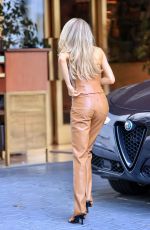 CHARLOTTE MCKINNEY Arrives at Sunset Towers in Los Angeles 06/23/2021