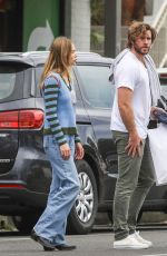 GABRIELLA BROOKS and Liam Hemsworth Out Shopping in Byron Bay 06/27/2021