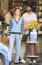 GABRIELLA BROOKS and Liam Hemsworth Out Shopping in Byron Bay 06/27/2021