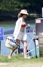 HILARIA BALDWIN in Bikini Top at a Boat in Montauk Hamptons Beach 06/05/2021