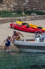 KATE HUDSON in a Yellow Swimsuit on Vacation in Greece 06/17/2021