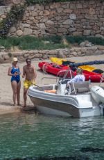 KATE HUDSON in a Yellow Swimsuit on Vacation in Greece 06/17/2021