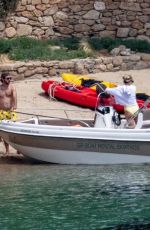 KATE HUDSON in a Yellow Swimsuit on Vacation in Greece 06/17/2021