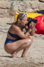 KATE HUDSON in Bikini at a Beach in Skiathos 06/19/2021