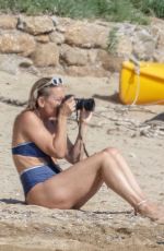 KATE HUDSON in Bikini at a Beach in Skiathos 06/19/2021