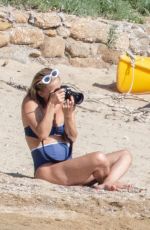 KATE HUDSON in Bikini at a Beach in Skiathos 06/19/2021