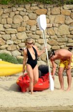 KATE HUDSON in Swimsuit at a Beach in Greece 06/13/2021