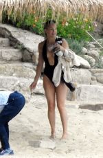 KATE HUDSON in Swimsuit at a Beach in Greece 06/13/2021