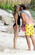 KATE HUDSON in Swimsuit at a Beach in Greece 06/13/2021