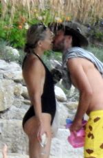 KATE HUDSON in Swimsuit at a Beach in Greece 06/13/2021