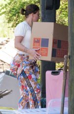 KATIE PRICE Starting to Move Belongings Back to Her Mansion in Sussex 06/13/2021