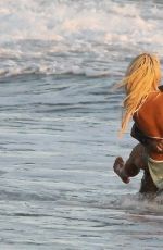 LILY JAMES in Biini as Pamela Anderson on the Set of Pam and Tommy in Cancun 06/21/2021