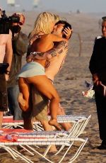 LILY JAMES in Biini as Pamela Anderson on the Set of Pam and Tommy in Cancun 06/21/2021