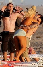 LILY JAMES in Biini as Pamela Anderson on the Set of Pam and Tommy in Cancun 06/21/2021