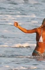 LILY JAMES in Biini as Pamela Anderson on the Set of Pam and Tommy in Cancun 06/21/2021