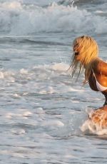 LILY JAMES in Biini as Pamela Anderson on the Set of Pam and Tommy in Cancun 06/21/2021