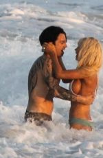 LILY JAMES in Biini as Pamela Anderson on the Set of Pam and Tommy in Cancun 06/21/2021
