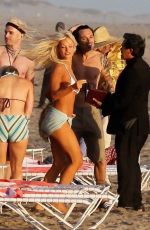 LILY JAMES in Biini as Pamela Anderson on the Set of Pam and Tommy in Cancun 06/21/2021