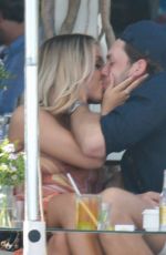 LOTTIE TOMLINSON and Lewis Burton on Vacation in Marbella 06/27/2021