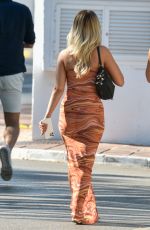 LOTTIE TOMLINSON and Lewis Burton on Vacation in Marbella 06/27/2021