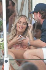 LOTTIE TOMLINSON and Lewis Burton on Vacation in Marbella 06/27/2021