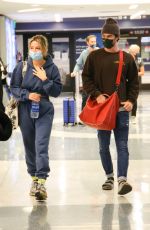 MADELYN CLINE and Chase Stokes at Los Angeles International Airport 05/31/2021