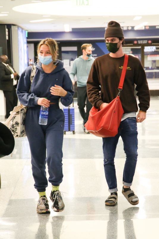 MADELYN CLINE and Chase Stokes at Los Angeles International Airport 05/31/2021