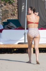 MARGOT ROBBIE in Bikini at a Beach in Puerto Vallarta 06/15/2021