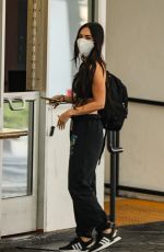 MEGAN FOX Waits for Car at a Valet in Beverly Hills 06/15/2021