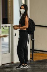 MEGAN FOX Waits for Car at a Valet in Beverly Hills 06/15/2021