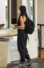 MEGAN FOX Waits for Car at a Valet in Beverly Hills 06/15/2021
