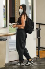 MEGAN FOX Waits for Car at a Valet in Beverly Hills 06/15/2021