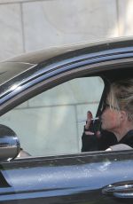 MELANIE GRIFFITH Driving Out from Gym Session in Los Angeles 06/24/2021